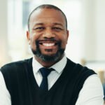 Home happy office portrait business black man with confidence ambition company pride startup agency professional person smile architecture real estate design creative career